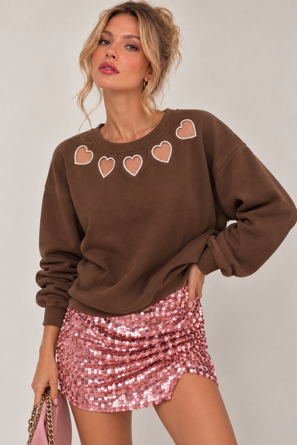 SUDADERA ABERTURAS CORAZONES