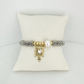 PULSERA CON PERLA Y DETALLE