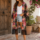 KIMONO ESTAMPADO TROPICAL CON FLECOS